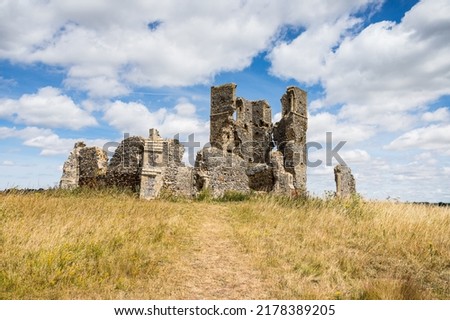 Ruined church of St James pictured under a blue sky in Bawsey, West Norfolk in July 2022.