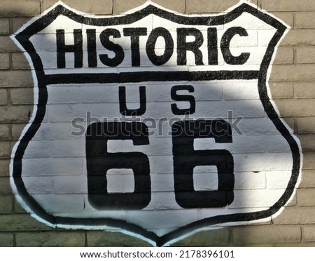 Route 66 sign on a wall - historic