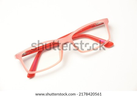 Eyeglass isolated on white. Pink eyeglasses. Eyewear on white. Pink eyewear  Royalty-Free Stock Photo #2178420561