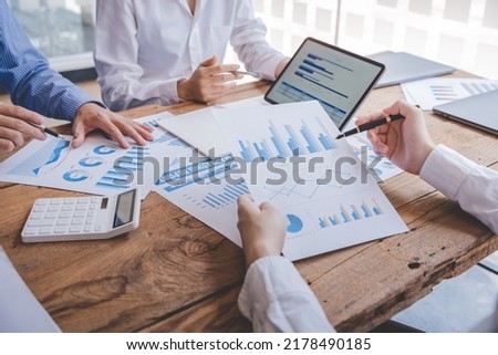 Young colleagues having great business conversations in a modern coworking office. Teamwork concept. Horizontal blurry background. Fireworks. Royalty-Free Stock Photo #2178490185