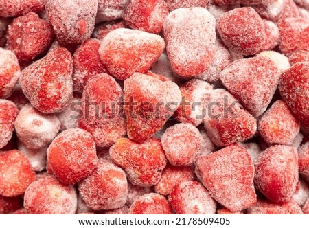 Pile of frozen strawberry for a background