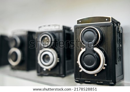 Twin-lens reflex camera. Group of Old Retro Analog Photo Cameras. Shallow Depth of Field