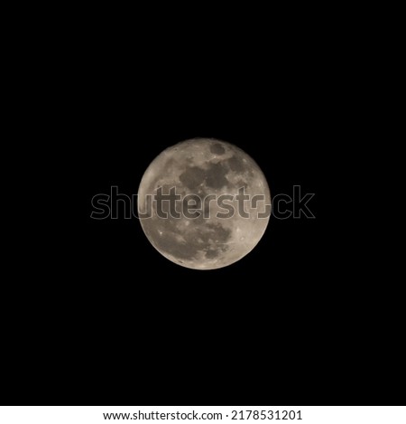 super full moon at clear night sky Depok, West Java, Indonesia, isolated picture, noisy at moon surface, harvest moon 