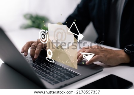 Email marketing idea. Target customers, send messages, invite individuals, send message notifications, give deals. Royalty-Free Stock Photo #2178557357