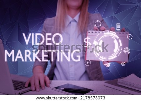Inspiration showing sign Video Marketing. Word for create short videos about specific topics using articles Lady in suit holding notepad representing innovative thinking.