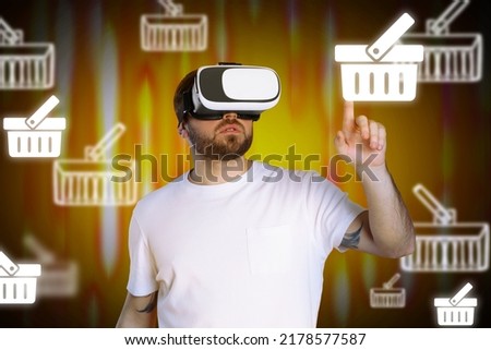 Virtual shopping. Man using VR headset on color background