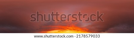 Dramatic dark burning red sunset sky panorama. Hdr seamless spherical equirectangular 360 panorama. Sky dome or zenith for 3D visualization and sky replacement for aerial drone 360 panoramas. Royalty-Free Stock Photo #2178579033