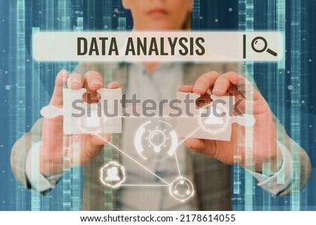 Inspiration showing sign Data Analysis. Word Written on Translate numbers to Analytical Conclusion Forecasting Lady in suit holding two puzzle pieces representing innovative thinking. Royalty-Free Stock Photo #2178614055