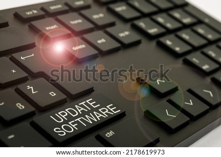 Text caption presenting Update Software. Conceptual photo replacing program with a newer version of same product Computer Keyboard And Symbol.Information Medium For Communication.