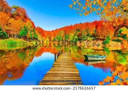 beautiful autumn landscape on the lake. Beautiful lake scenery with autumn leaves in colorful forest. Autumn colors in nature. Stunning nature landscapes. Beautiful forest lake view. Uludag, Turkey. Royalty-Free Stock Photo #2178626657