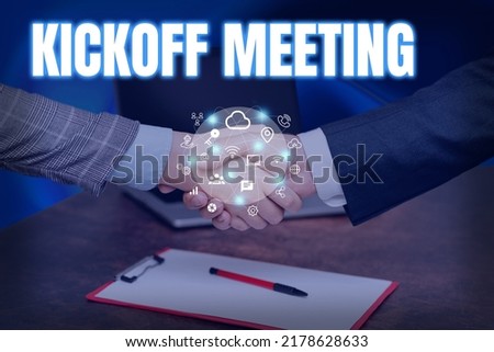 Conceptual caption Kickoff Meeting. Business concept Special discussion on the legalities involved in the project Hands Shaking Signing Contract Unlocking New Futuristic Technologies. Royalty-Free Stock Photo #2178628633