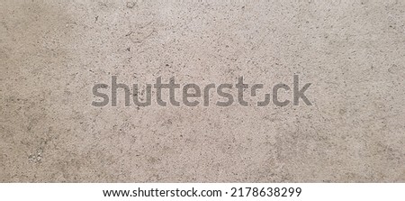 dark background with rustic texture with shades of gray and burnt cement