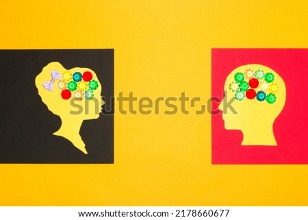 man and woman looking at each other, brains colorful creatively designed, art design, heads in a row and black part of yellow background
