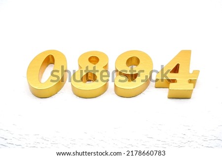   Number 0894 is made of gold painted teak, 1 cm thick, laid on a white painted aerated brick floor, visualized in 3D.                                 