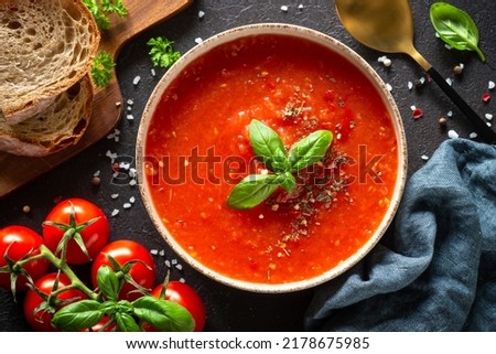 Tomato soup, vegan dish on white. Royalty-Free Stock Photo #2178675985