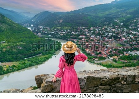 Tourist visiting at Jvari Monastery and Mtskheta city in Georgia. Royalty-Free Stock Photo #2178698485
