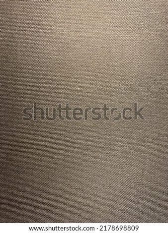 Blurred brown carbon fiber background