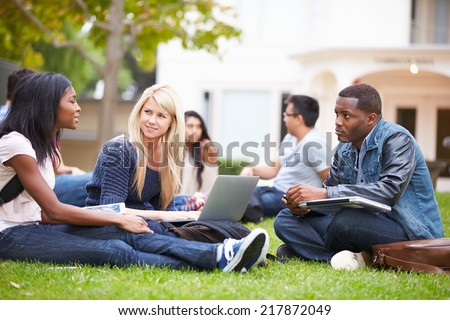 Group Of University Students Working Outside Together