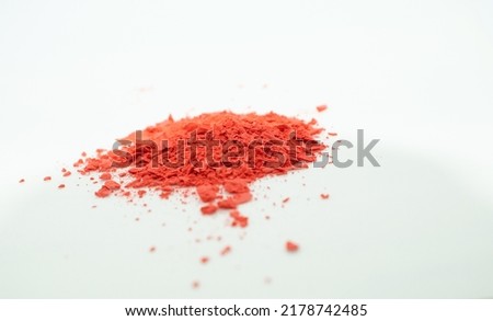 Cosmetic blush red powder. The contents of cosmetics.