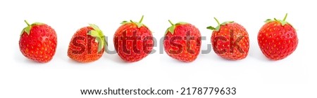 Strawberries isolated on white background. Wide still-life picture taken in studio with soft-box.
