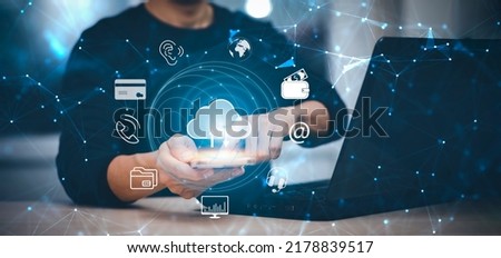 Man touching connect to data information on the Cloud Computing Technology Internet Storage Network Concept And a large database big data Through internet technology, Cloud sharing download and upload Royalty-Free Stock Photo #2178839517