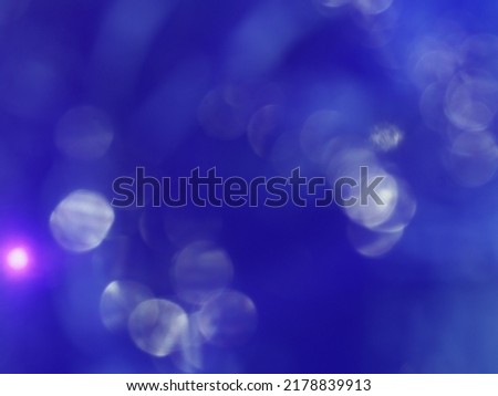 blur purple glittering light for abstract background.