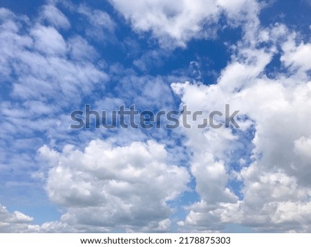 bright blue sky background with white clouds in spring