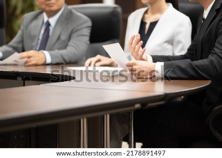 Asian businessmen having a meeting Royalty-Free Stock Photo #2178891497