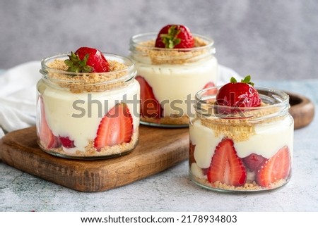 Strawberry magnolia. Dessert with cream and strawberry filling on a stone background. World cuisine delicacies. close up