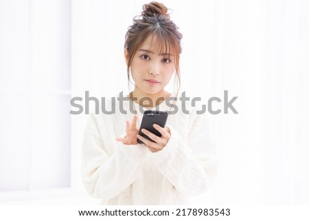 Young woman using a smartphone