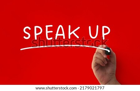 Speak up text on red cover background. Business concept Royalty-Free Stock Photo #2179021797