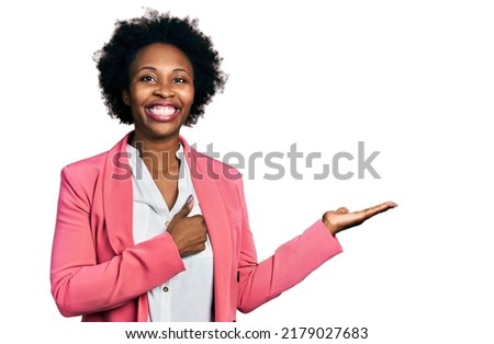 African american woman with afro hair wearing business jacket showing palm hand and doing ok gesture with thumbs up, smiling happy and cheerful 