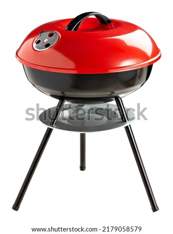 BBQ Grill Isolated on White Background. Portable Black and red BBQ Grillware Stove. Outdoor Cooking Station. Front View of Charcoal Kettle Barbecue Grill Royalty-Free Stock Photo #2179058579