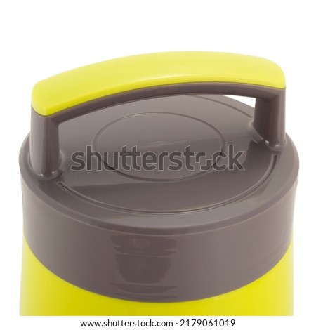 yellow plastic container thermos for food on a white background