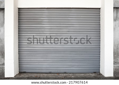 Gray metal garage gate, background photo texture