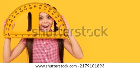 wow. modern education. measurement. trigonometry stationery. Portrait of schoolgirl student, studio banner header. School child face, copyspace.