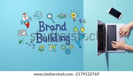 Brand building with person working with a laptop