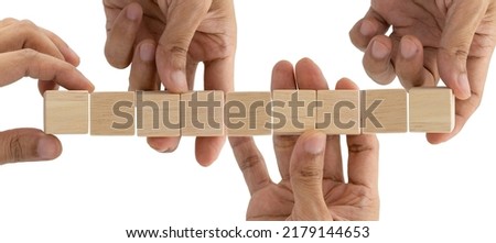 Many hand holding 9 blank wooden block cubes on a white background for your text. free space for business concept template and banner.
