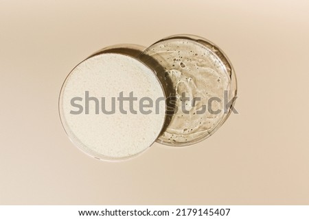 Samples of powder and live collagen on beige background close upper view.  Royalty-Free Stock Photo #2179145407