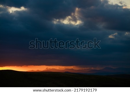 Dark and cloudy sunset in Summer