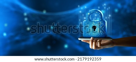 Man hand holding Padlock with Keyhole on Smartphone. Cyber data and information privacy. Future technology security, Network protection, and Modern safety digital Concept. Royalty-Free Stock Photo #2179192359