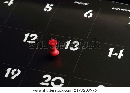      friday 13th on calendar with a pin                           Royalty-Free Stock Photo #2179209975