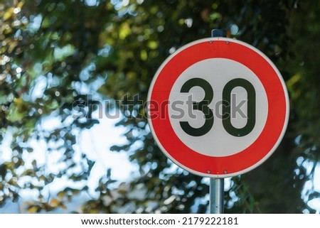 German traffic sings- speed limit 30 Royalty-Free Stock Photo #2179222181