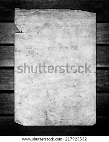 Black and White old paper on brown wood texture, horizontal slats from a weathered bench 