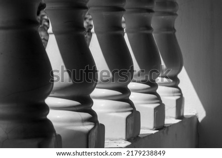 Light and shadow of balustrade. Black and white photography.