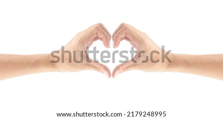 Heart with hand gesture, Body language, Symbolic of love, Isolated on white background, Clipping path Included. Royalty-Free Stock Photo #2179248995