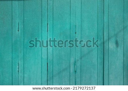 Green coloured wooden scratched background. Natural background, High resolution picture.