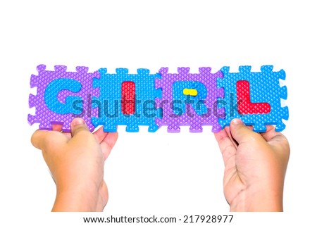 Hands forming word alphabet puzzle