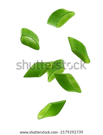 Falling chopped Green Onion isolated on white background, full depth of field, clipping path Royalty-Free Stock Photo #2179292739