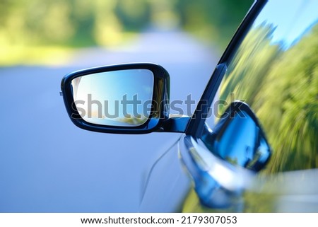 Focus on rear view mirror of modern car Royalty-Free Stock Photo #2179307053